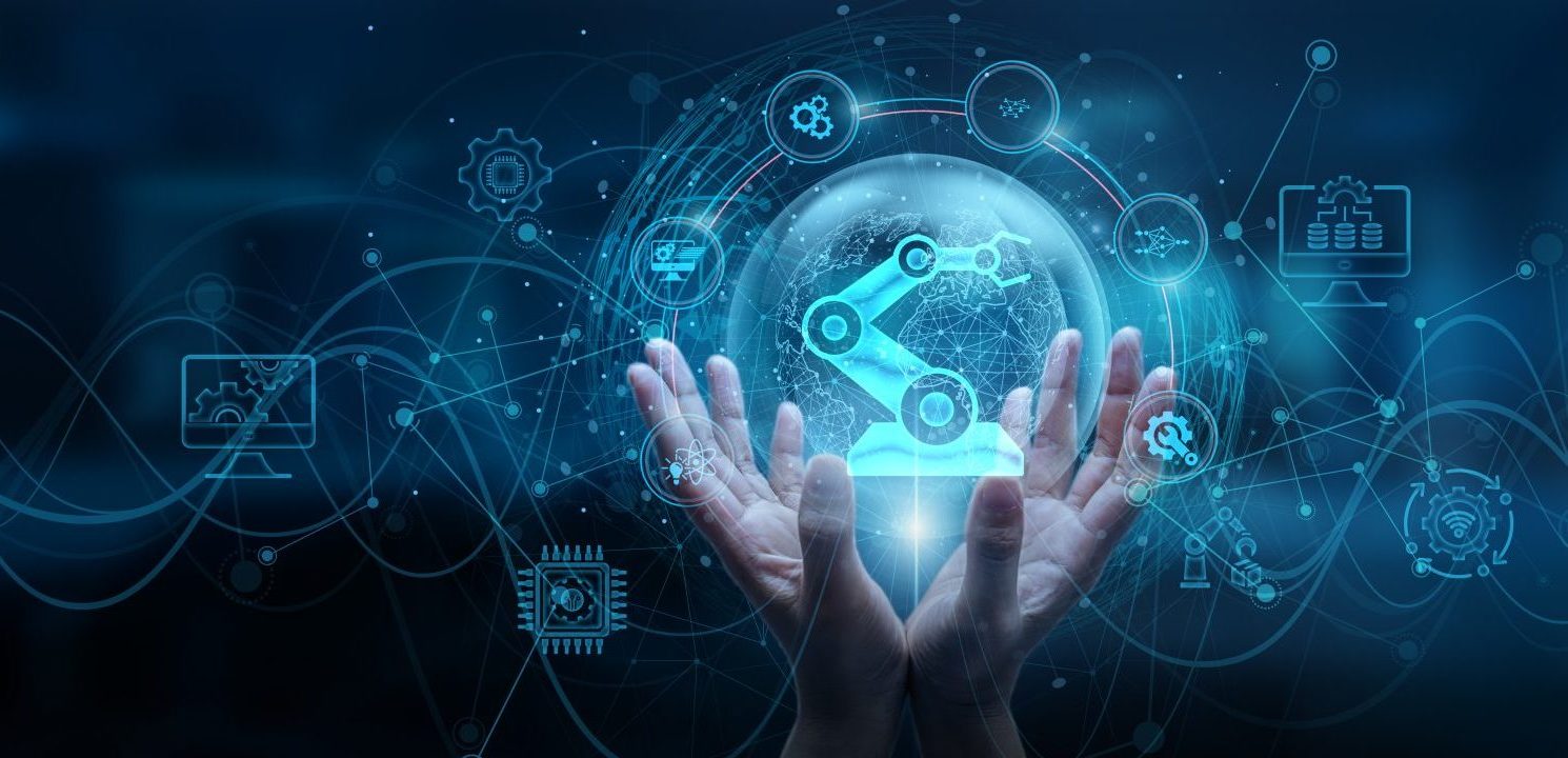 Hands holding a glowing sphere with interconnected manufacturing and automation icons, representing real-time data integration in manufacturing.